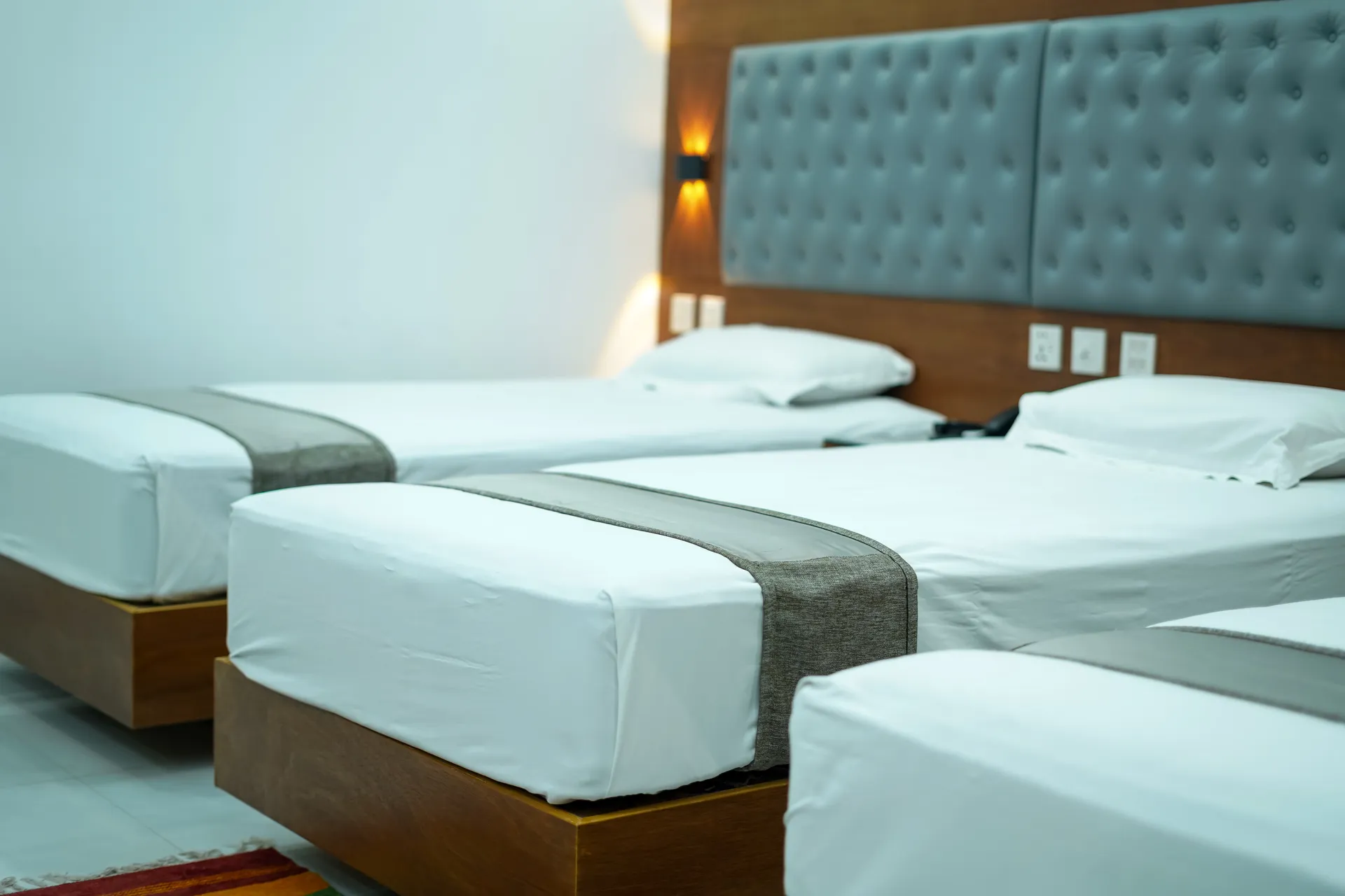 Sky Lawn Hotel’s guest room features a modern design with a distinctive circular ceiling motif (i...